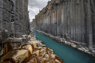 Stuðlagil Canyon, turquoise river between basalt columns, Egilsstadir, Iceland, Europe