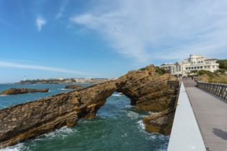 Wooden bridge together to Plage du Port Vieux in Biarritz, holiday in south-eastern France.