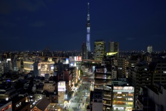 City view with the Skytree, with 634 meters the highest television tower of the earth, blue hour,