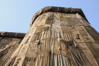Torwache wrapped with old jute sacks, Check Point Sekondi Loco, by artist Ibrahim Mahama, documenta
