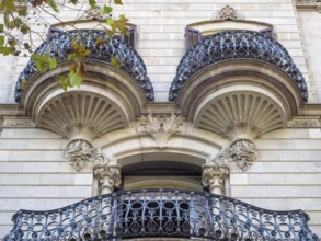 Beautifully shaped balconies on the modernist facade of a residential building, Barcelona,