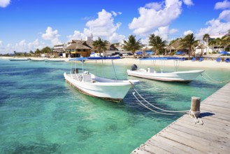 Puerto Morelos beach boats in Mayan Riviera Maya of Mexico