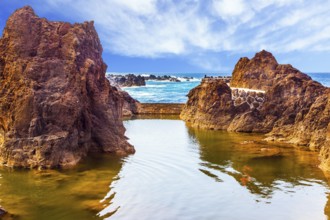 Rocks of the Atlantic coast. The concept of exotic and ecological tourism. Volcanic island of