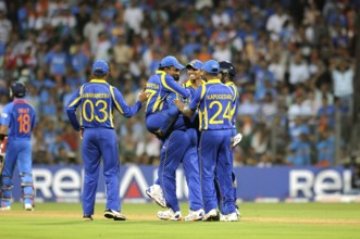Sri Lankan player 2L Mahela Jaywerdena leaps wicket batsman Virat Kohli L ICC Cricket World Cup