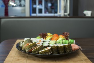 Plate of sushi in restaurant