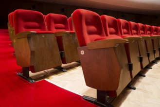 Red seats in a theater and opera