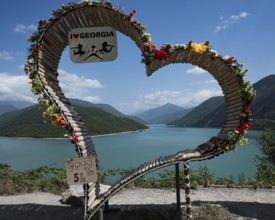 ZHINVALI, GEORGIA - AUGUST 18, 2023: Big heart next to water reservoir artificial lake Zhinvali in