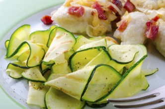 Silesian dumplings with Bacon and zucchini