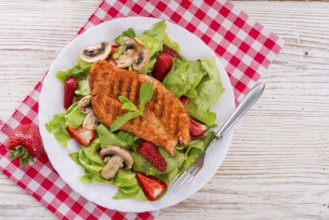 Steak with green salad