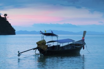 Silhouette of longtail boat on the sunset near Phi-Phi island, Thailand, Thailand, Asia