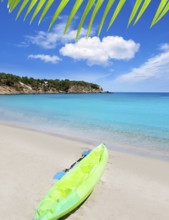 Cala Llenya in Ibiza kayak with turquoise water in Balearic islands
