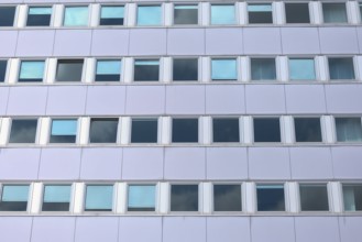 Facade of an modern large house, wall with windows