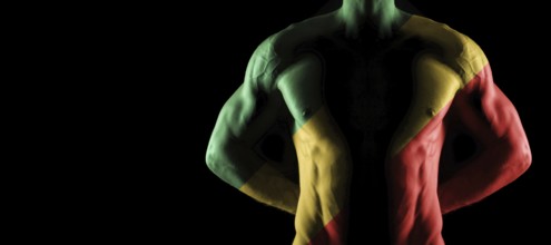 Republic of the Congo flag on muscled male torso with abs, black background