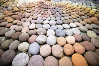 Photographic shot of the multicolor composition of a mosaic made of stones