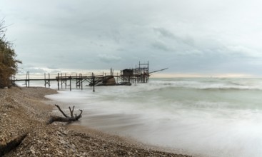 A view of the Trabocco Punto le Morge pile dwelling on an overcast an rainy day on the Costa dei
