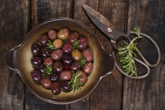 Italian food, snack of olives in brine presented in flat