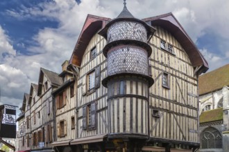 Street with historical half-timbered houses in Troyes city center, France, Europe