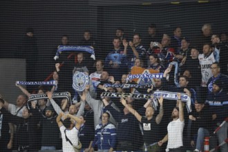The travelling Ingolstadt fans celebrate the 6:3 victory in Schwenningen after the game of the DEL