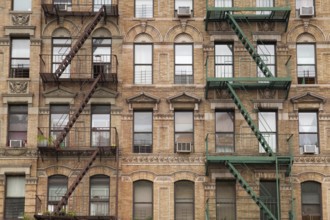 The typical old houses with fire stairs in New York in USA