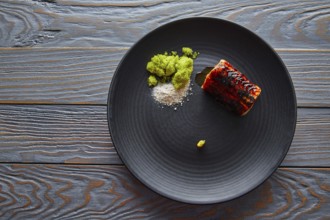 Grilled smoked eel with green apple and citrus with Sichuan Electric flower