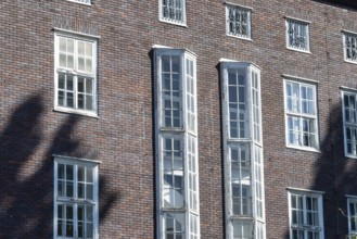 Facade of an modern large house, wall with windows
