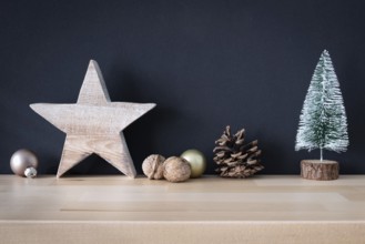 Christmas decoration glass balls with wooden star and fir tree