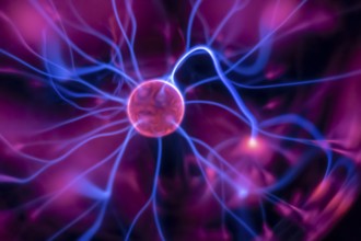 An image of a plasma lamp with moving light beams