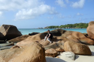 Seychelles island Praslin with the famous granite rocks on the beach of Anse Latio