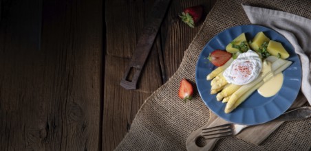 Boiled asparagus with egg and potatoes