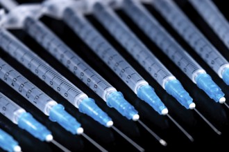 Medical Syringes Needle on Black Background, Close up Syringe, Health care concept