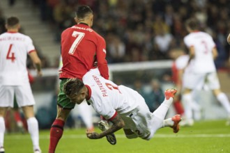 Football match, captain Cristiano RONALDO CR7 Portugal left looking from behind in a duel with