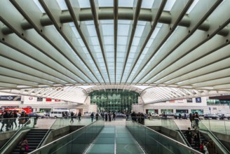 Lisbon, Portugal: 12 28 2018: Travellers walking in and out the Oriente railwaystation