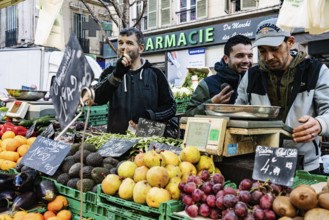 People selling fruit and vegetables, market in Noailles, Marseille