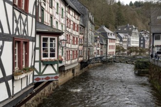 City Monschau in Region national park Eifel. Old town with old houses and river Rur