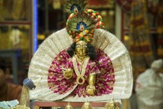 Krishna idol in shop kept for sale, mathura, uttar pradesh, india, asia