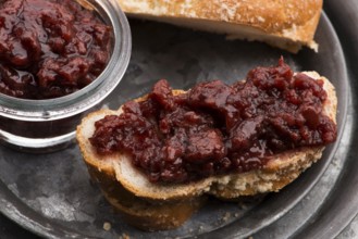 Sweet bread (challah) with cherry jam