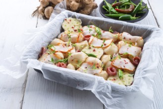 Jerusalem artichoke au gratin with ham and chili