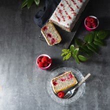 Poppy seed cake with raspberries and desiccated coconut