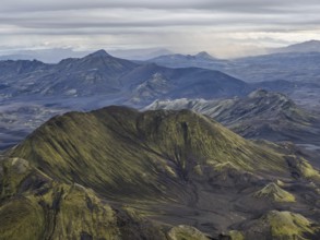 View from Mount Sveinstindur, volcanic landscape, moss-covered hills, mountains, Icelandic