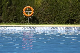 Buoy and swimming pool