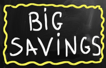 Big savings handwritten with white chalk on a blackboard