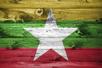 Myanmar flag on wooden planks background wood flag