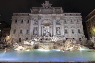 The Trevi Fountain, one o'clock in the morning at the blue hour. No people, but well lit.