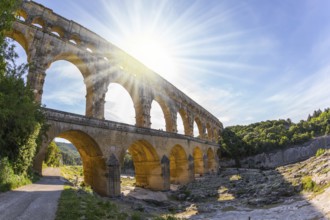 The bridge was built in Roman times on the river Gardon. Three-tiered aqueduct Pont du Gard - the