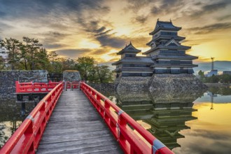 Matsumoto Nagano Japan, sunrise city skyline at Matsumoto Castle with autumn foliage season