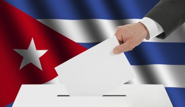 The Cuban flag and the hand with the bulletin about the ballot box