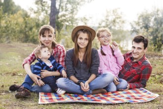Happy frendly family have a picnic outdoor