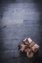 Beaul present box-container on vintage wood board holiday concept