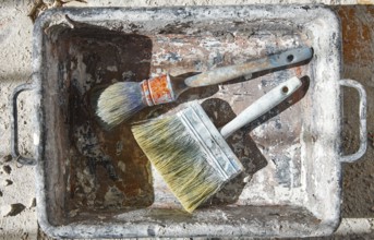 Paint brushes used on debris improvement background