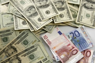 Dolar versus euro notes, finance metaphor image